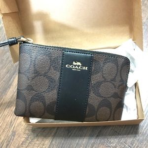 Chocolate color Coach Wristlet